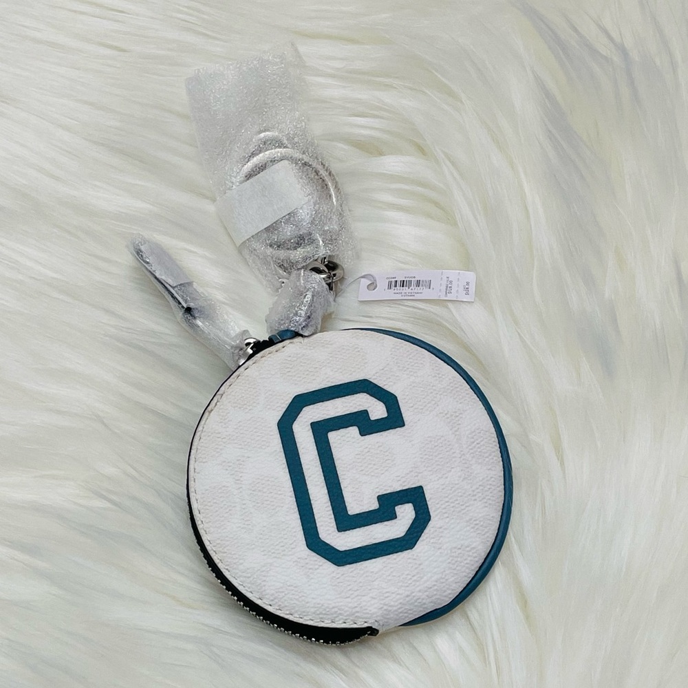 Coach Circular Coin Pouch In Signature Canvas With Varsity Motif In White